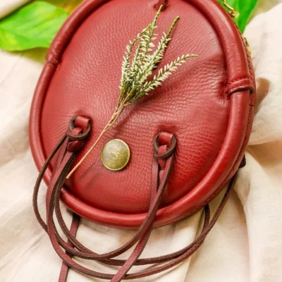 Minimalist Red Leather Sporran with Long Tassel Cords and Brass Button Closure